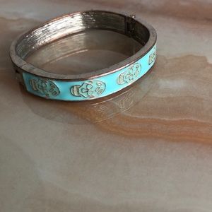 Turquoise and gold enamel skull bracelet